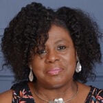Portrait of Cynthia J, who lives with relapsing multiple sclerosis and takes BRIUMVI