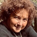 Portrait of Julie, living with relapsing multiple sclerosis and taking BRIUMVI